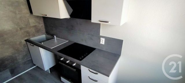 Appartement à louer - 4 pièces - 74.49 m2 - LONS LE SAUNIER - 39 - FRANCHE-COMTE - Century 21 Avenir Immobilier